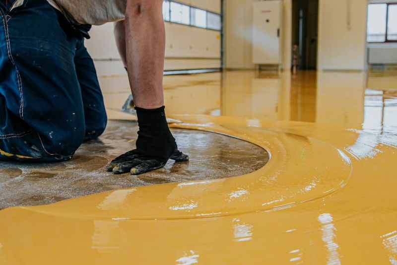 levelling epoxy coating on garage flooring
